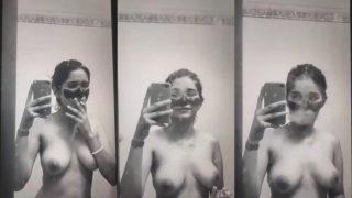 Sexy Indian Girlfriend Smokes And Reveals Her Boobs In Mirror Selfie