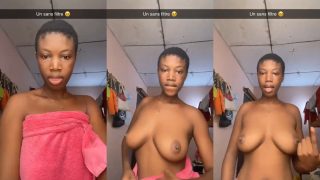 Nigerian Girl Takes Off Her Towel, Flaunting Her Boobs In Nude Video
