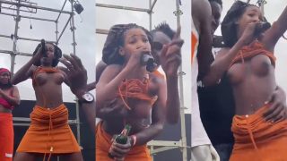 Angola Lady “Kudurista” Performing On Stage, Flaunting Her Boobs, Her Boobs Squeezed
